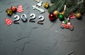 happy new year 2022 number 2022 symbol christmas decorations branches gray concrete 231813 570